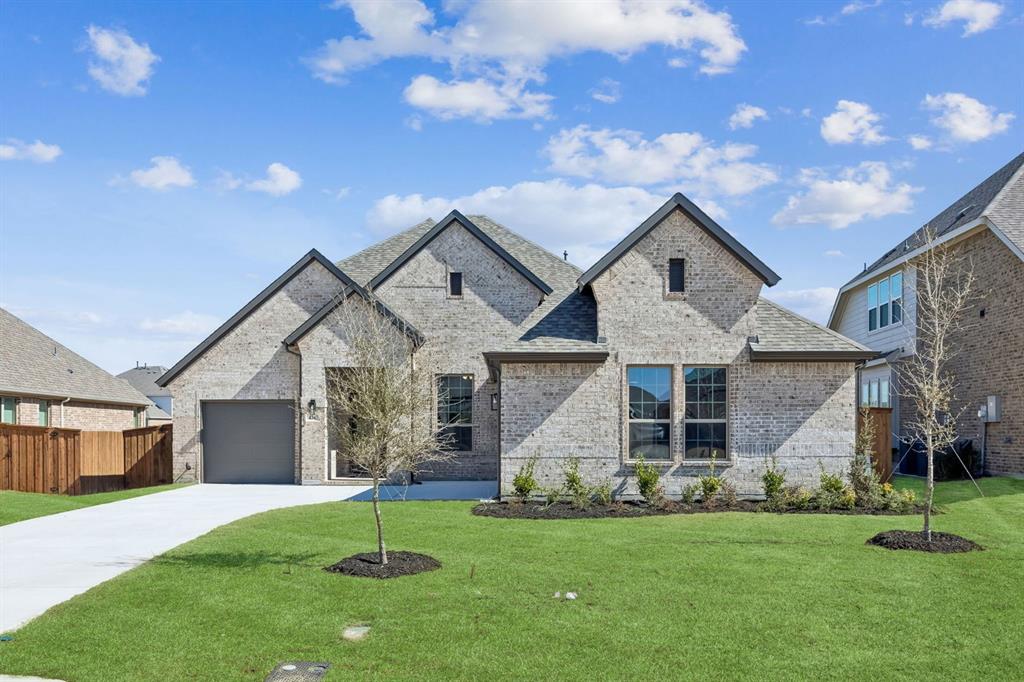 4345 Biddle Street Midlothian, TX 76065 - Photo 1 of 1 a front view of a house with a yard