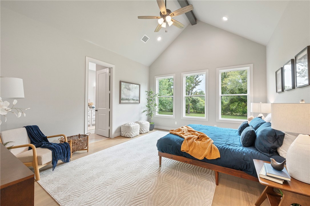13291 Hopes Creek Road College Station, TX 77845 - Photo 13 of 45 Primary Bedroom with high vaulted ceiling, beam ceiling, ceiling fan, light wood-style floors, and recessed lighting