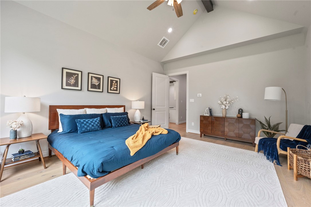 13291 Hopes Creek Road College Station, TX 77845 - Photo 14 of 45 Primary Bedroom with high vaulted ceiling, beamed ceiling, wood finished floors, recessed lighting, and a ceiling fan