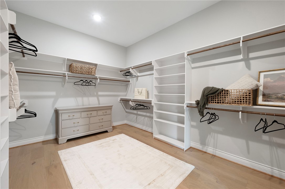 13291 Hopes Creek Road College Station, TX 77845 - Photo 18 of 45 Primary closet with wood floors