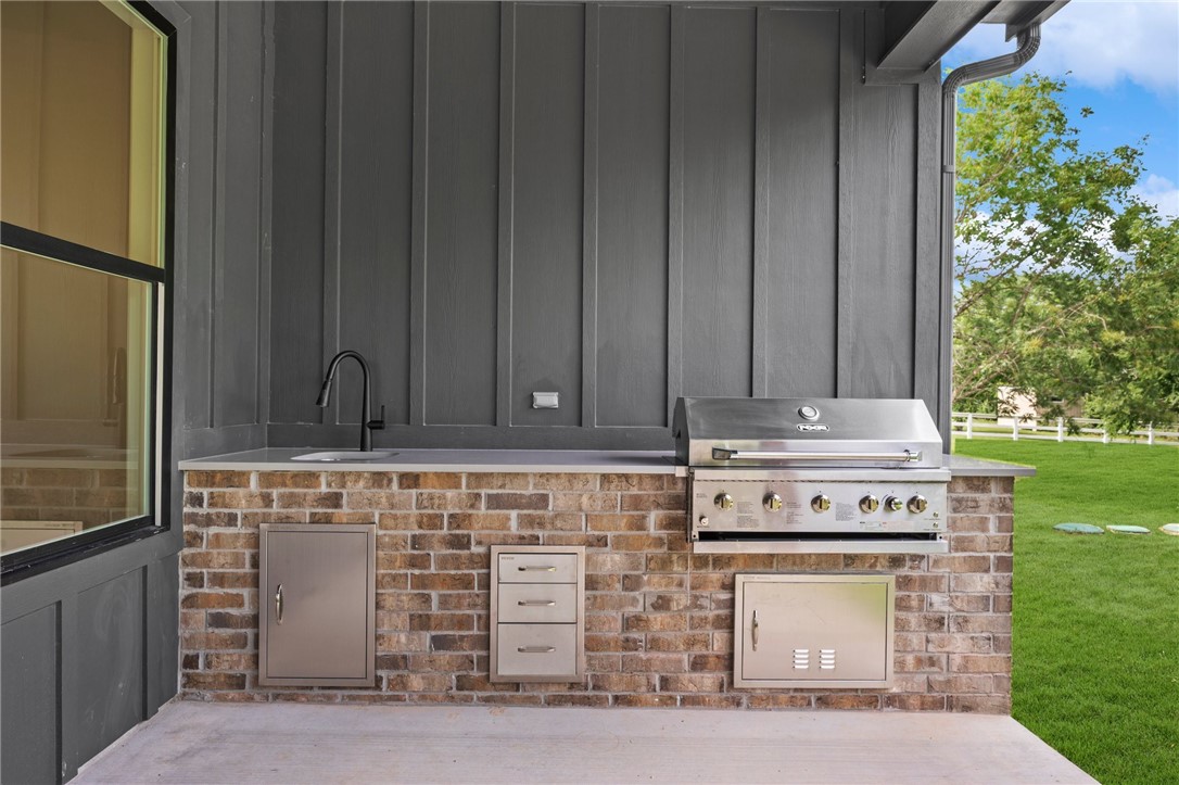 13291 Hopes Creek Road College Station, TX 77845 - Photo 33 of 45 View of patio / terrace with area for grilling and a sink