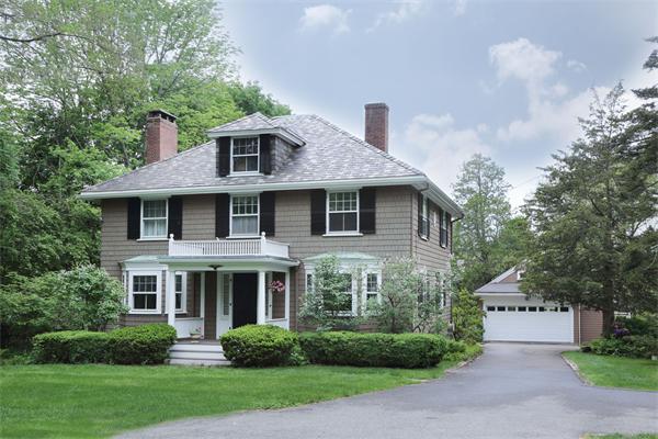 10 Concord Road Wayland, MA 01778 - Photo 1 of 6 a front view of a house with garden