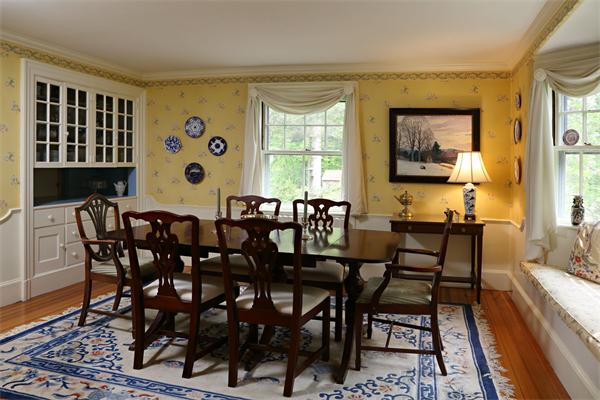 10 Concord Road Wayland, MA 01778 - Photo 4 of 6 a view of a dining room with furniture and a window