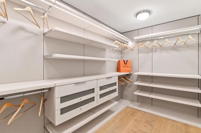 a bathroom with a toilet sink and shower