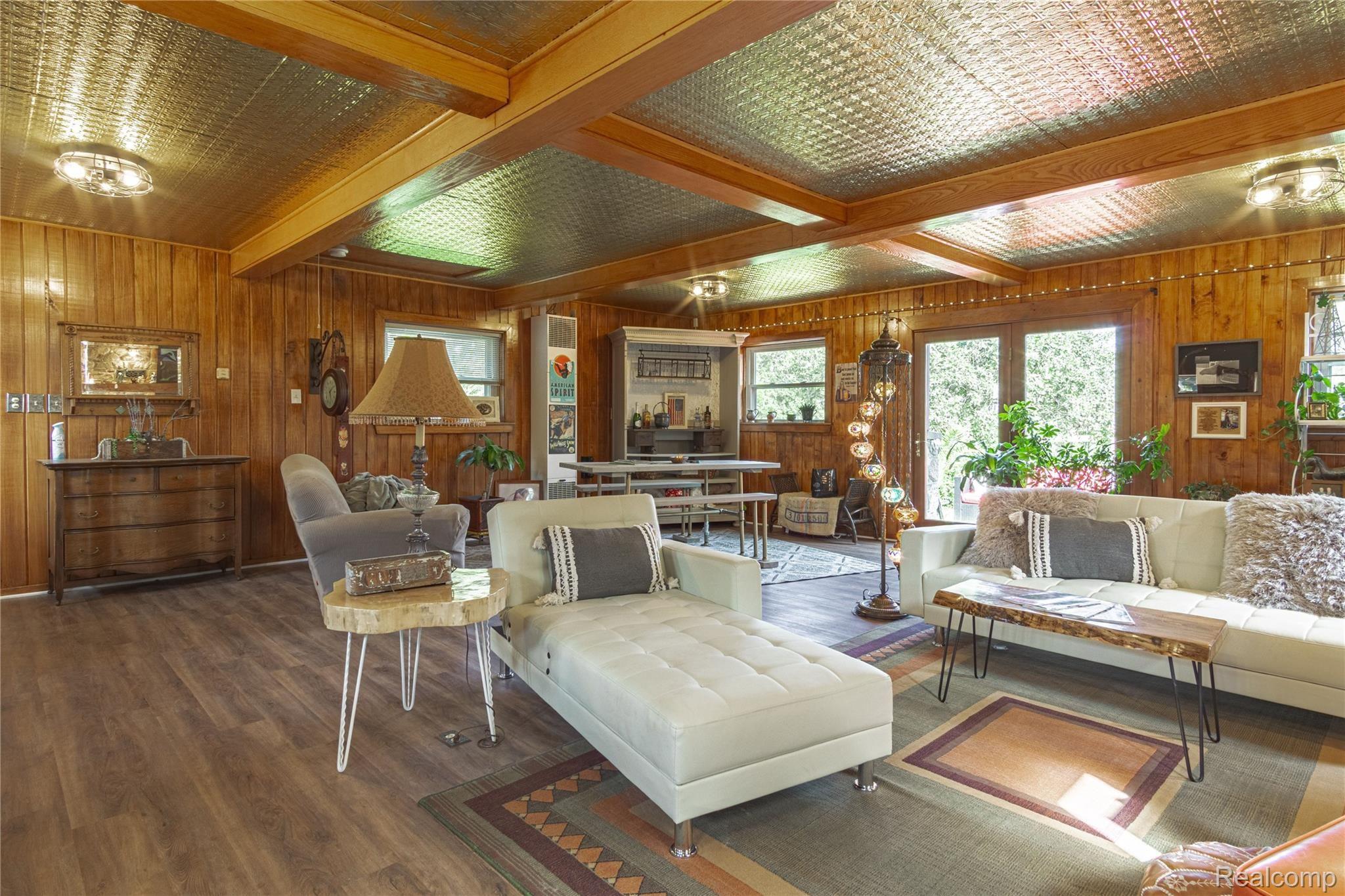 6047 North Latson Road Howell, MI 48855 - Photo 8 of 18 Large family room, new LVP flooring