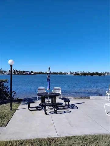 a view of a terrace with chairs
