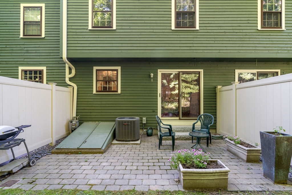 10 Apple Ridge Road, Unit 4 Maynard, MA 01754 - Photo 26 of 27 a view of outdoor seating area with furniture