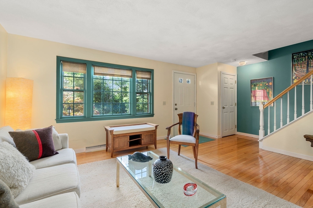 10 Apple Ridge Road, Unit 4 Maynard, MA 01754 - Photo 3 of 27 a living room with furniture and a window