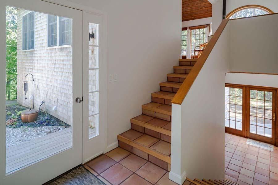 45 Old Long Pond Road Wellfleet, MA 02667 - Photo 18 of 47 a view of a hallway with wooden floor and entryway