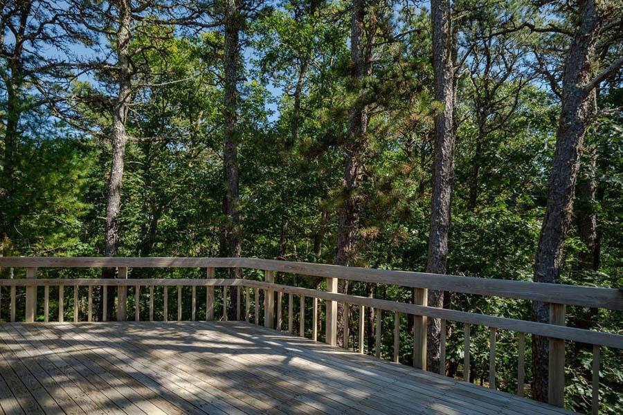 45 Old Long Pond Road Wellfleet, MA 02667 - Photo 21 of 47 a view of a wooden deck