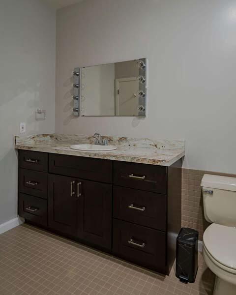 45 Old Long Pond Road Wellfleet, MA 02667 - Photo 27 of 47 a bathroom with a granite countertop toilet sink and mirror