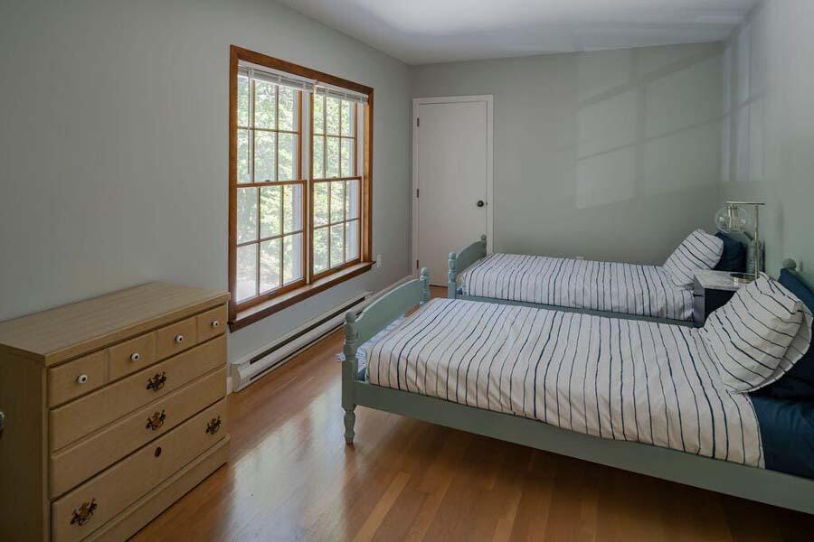 45 Old Long Pond Road Wellfleet, MA 02667 - Photo 28 of 47 a bedroom with a bed and window