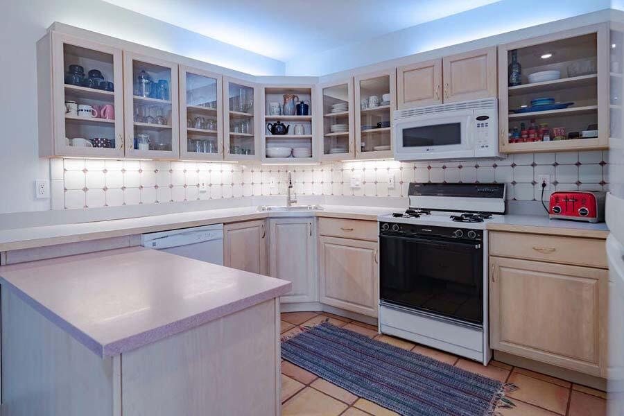 45 Old Long Pond Road Wellfleet, MA 02667 - Photo 3 of 47 a kitchen with stainless steel appliances granite countertop a stove and a sink