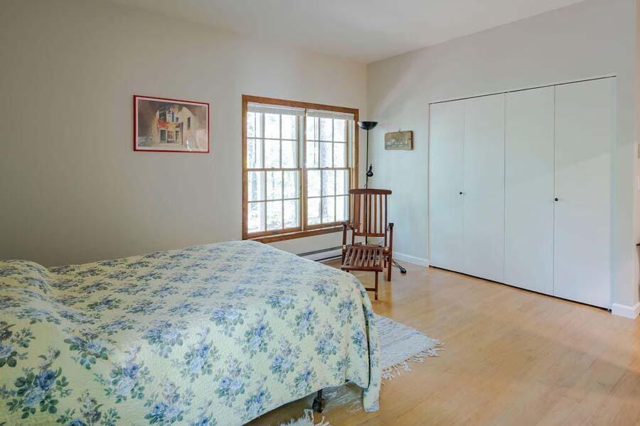 45 Old Long Pond Road Wellfleet, MA 02667 - Photo 31 of 47 a bedroom with a bed and a window