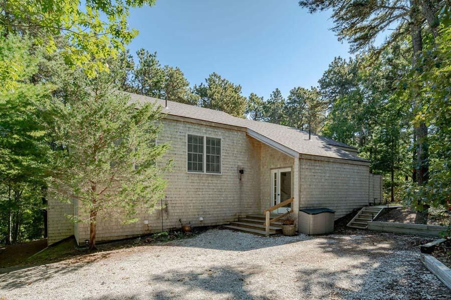 45 Old Long Pond Road Wellfleet, MA 02667 - Photo 41 of 47 a view of a house with a yard