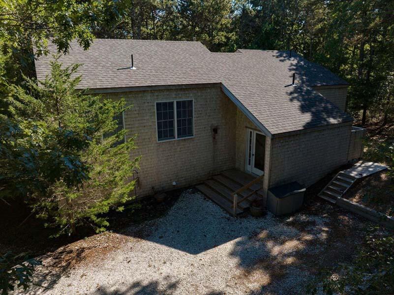 45 Old Long Pond Road Wellfleet, MA 02667 - Photo 42 of 47 a view of a house with a yard