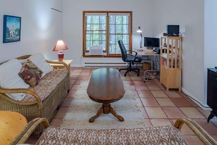 45 Old Long Pond Road Wellfleet, MA 02667 - Photo 7 of 47 a living room with furniture and a window