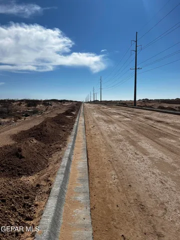 a view of a backyard of the house