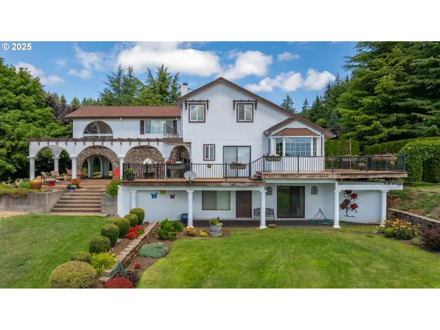a view of house and outdoor space with yard