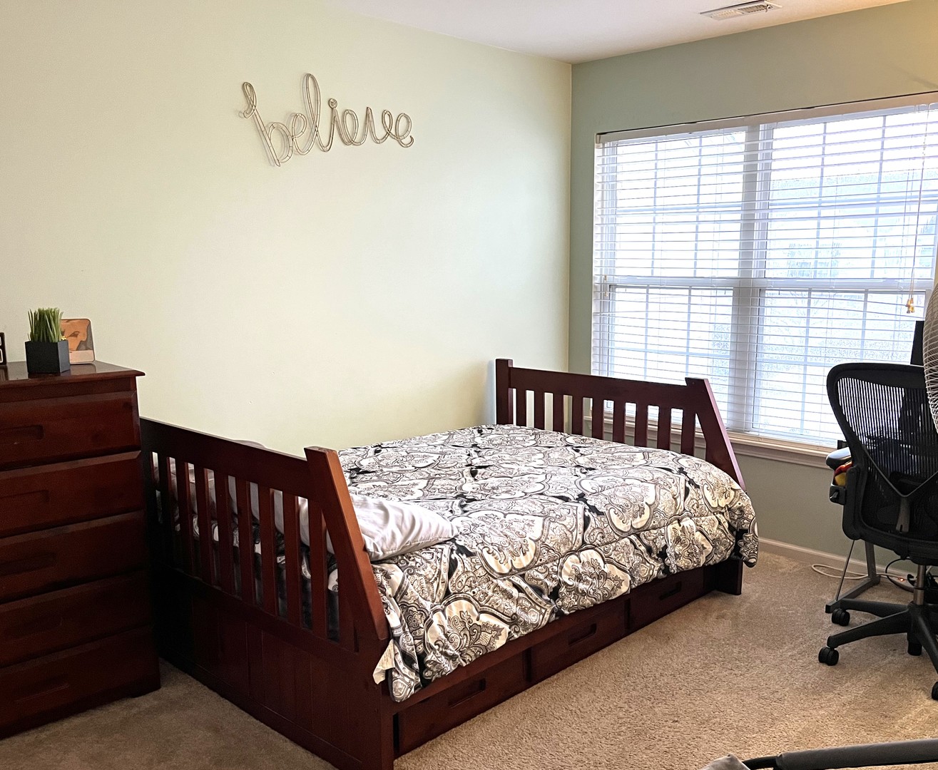 2402 Georgetown Circle Aurora, IL 60503 - Photo 19 of 23 a bedroom with a bed and a window