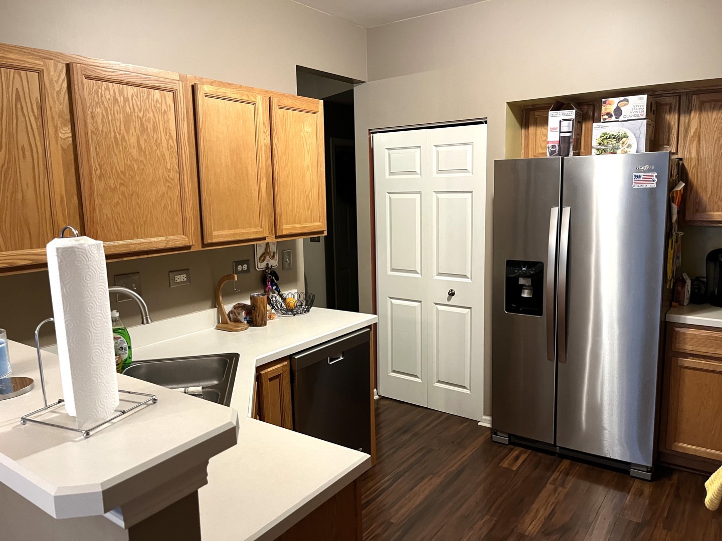 2402 Georgetown Circle Aurora, IL 60503 - Photo 6 of 23 a kitchen with stainless steel appliances a refrigerator and wooden floor