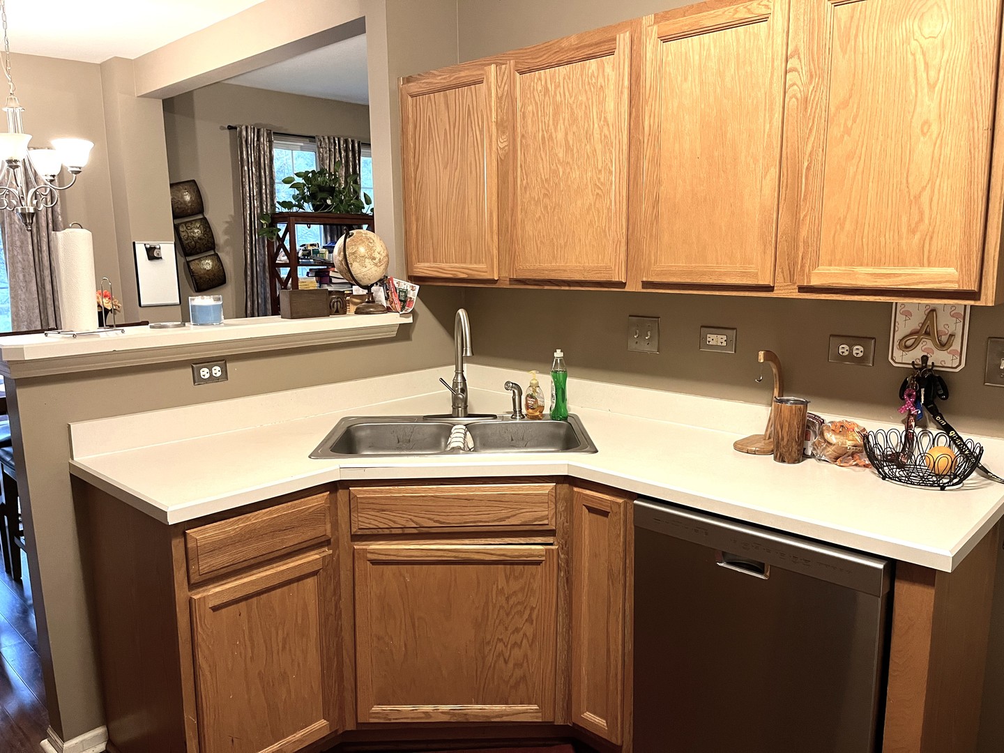 2402 Georgetown Circle Aurora, IL 60503 - Photo 7 of 23 a kitchen with a sink and a window