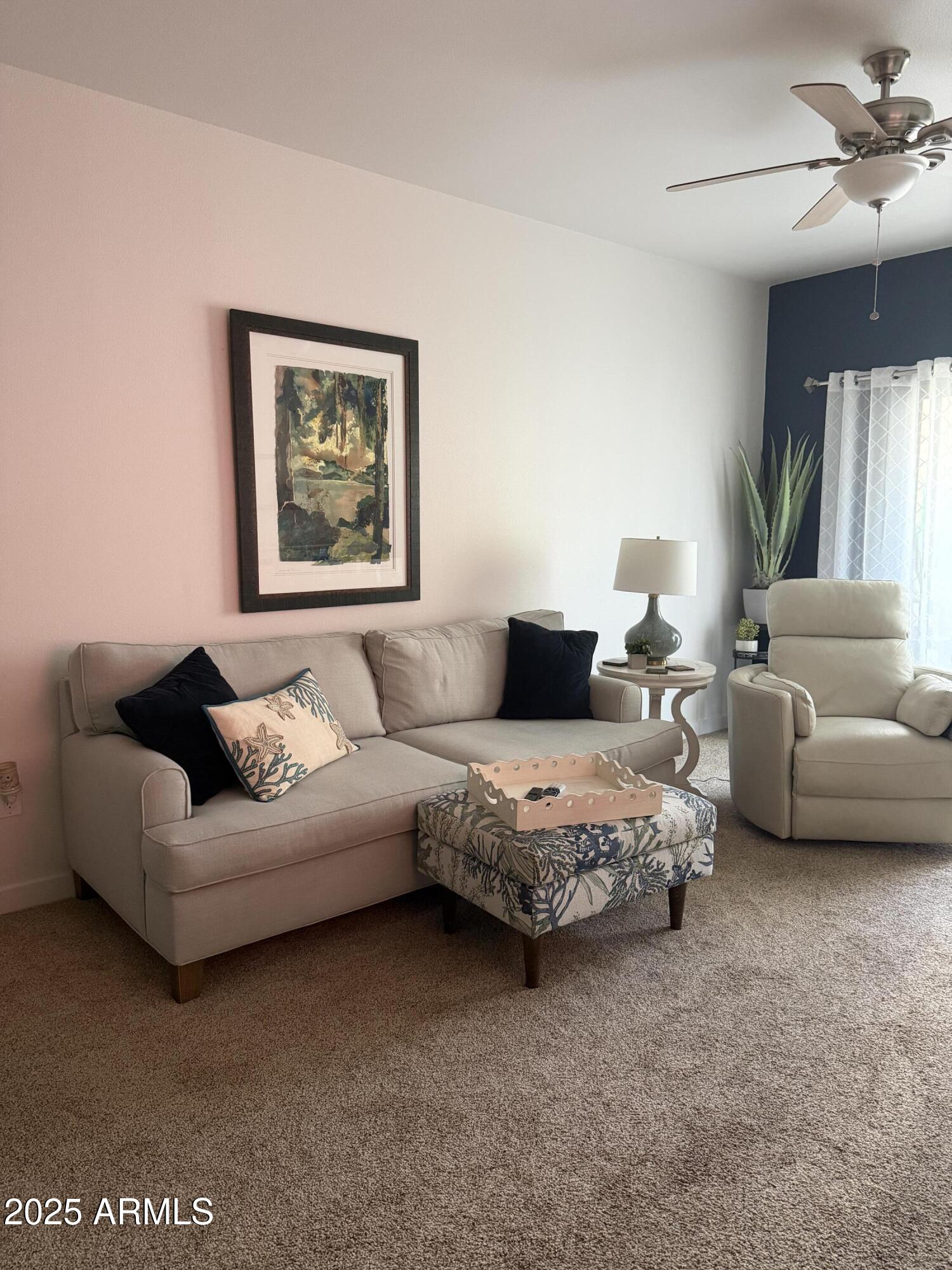 2511 West Queen Creek Road, Unit 223 Chandler, AZ 85248 - Photo 11 of 29 a living room with furniture and a couch