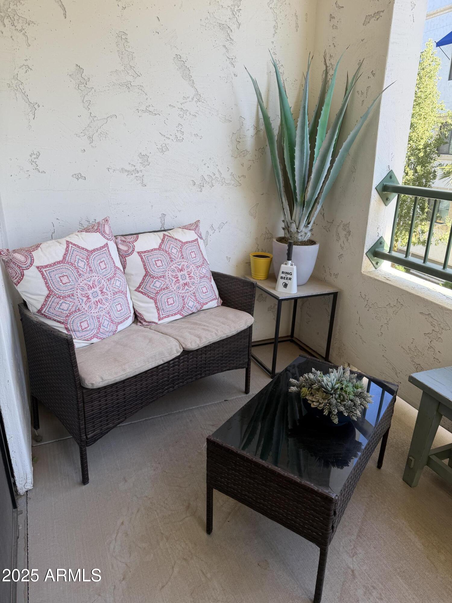 2511 West Queen Creek Road, Unit 223 Chandler, AZ 85248 - Photo 15 of 29 a living room with furniture and a potted plant