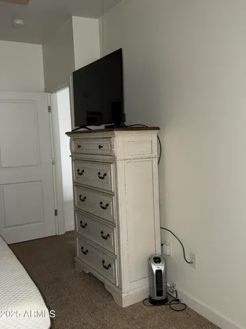 a view of storage and utility room with washer and dryer