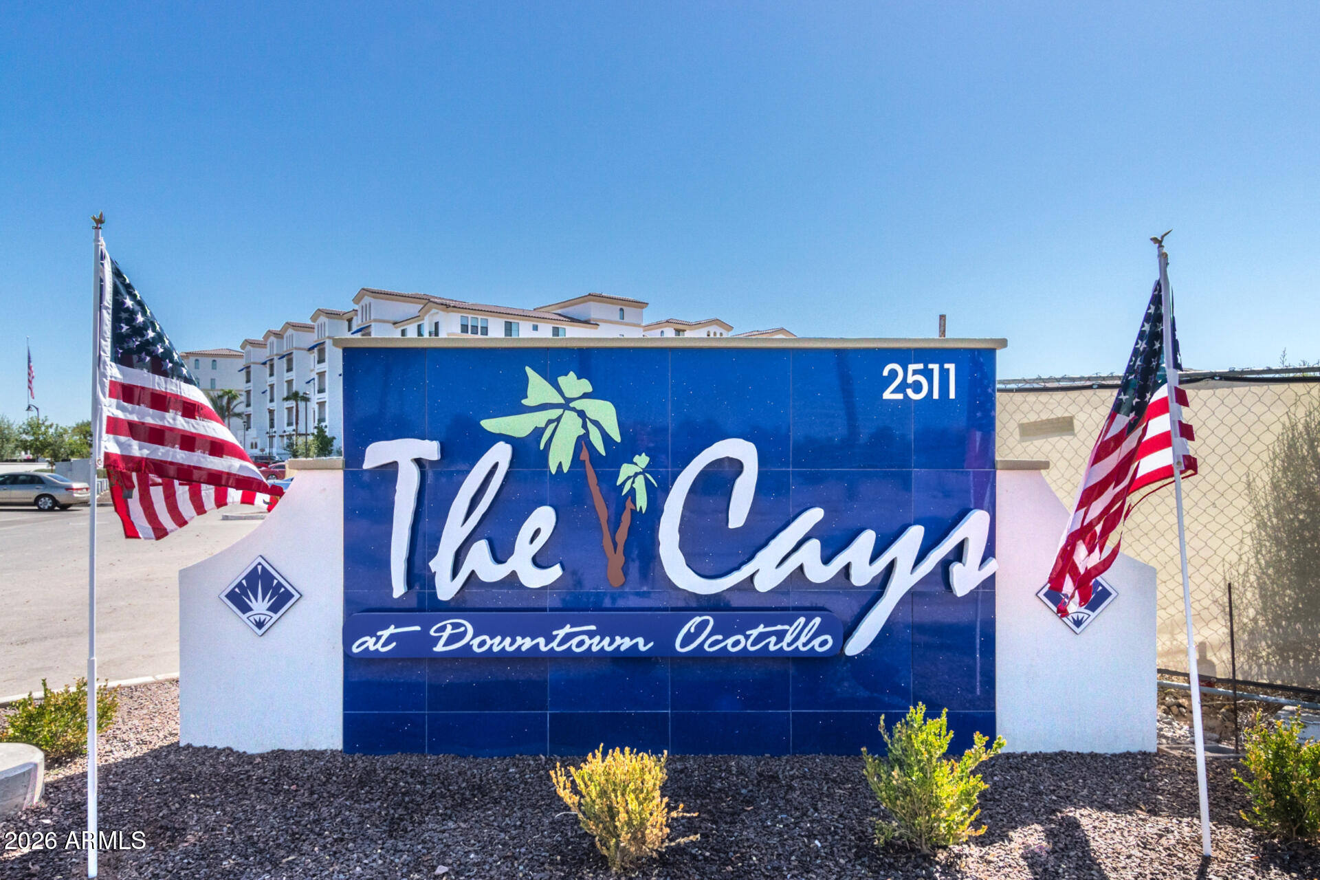 2511 West Queen Creek Road, Unit 223 Chandler, AZ 85248 - Photo 48 of 61 a street sign on a pole