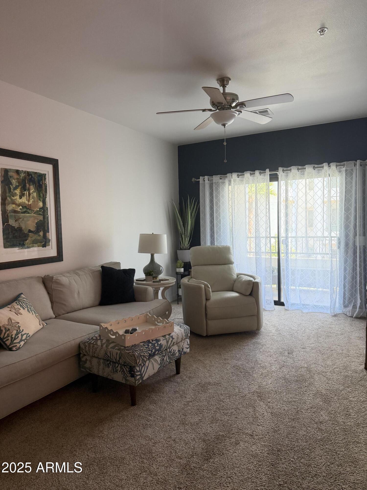 2511 West Queen Creek Road, Unit 223 Chandler, AZ 85248 - Photo 10 of 29 a bedroom with furniture and a large window
