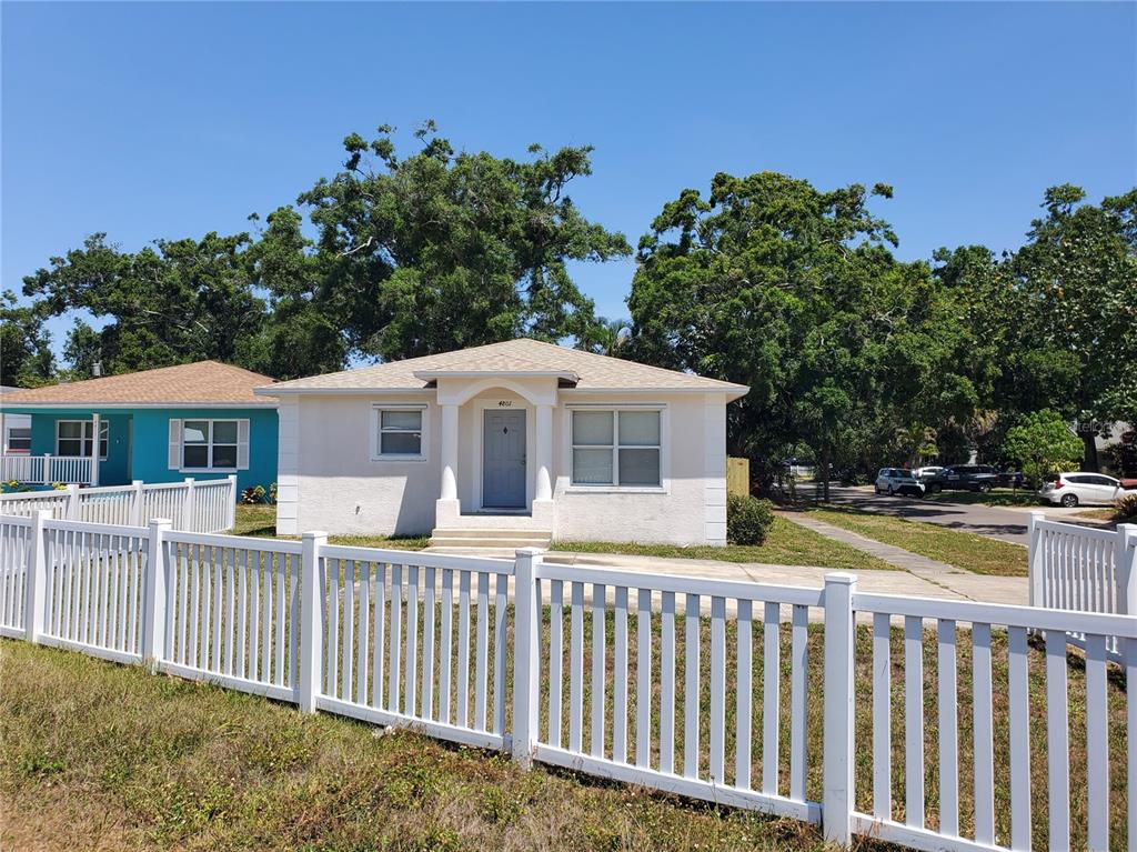 4801 Haines Road North St. Petersburg, FL 33714 - Photo 1 of 1 a front view of a house with a garden