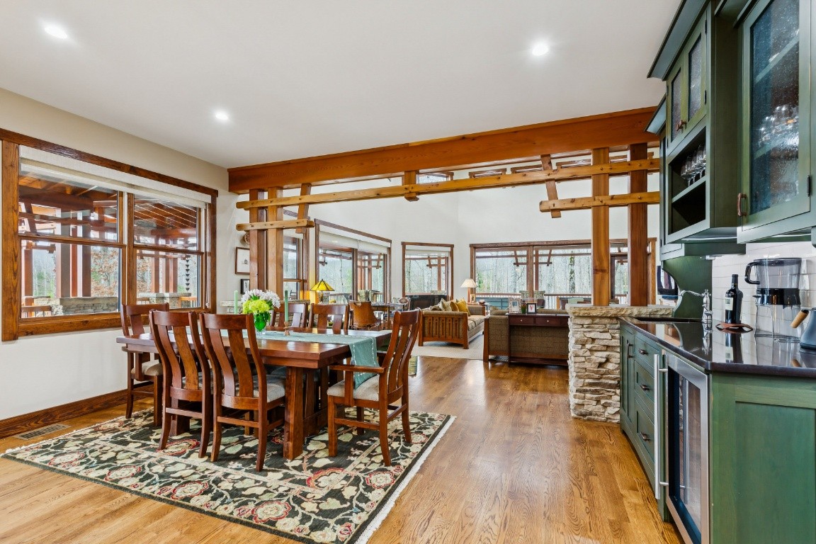 394 Myers Point Road Sewanee, TN 37375 - Photo 13 of 44 a view of a dining room with furniture window and wooden floor