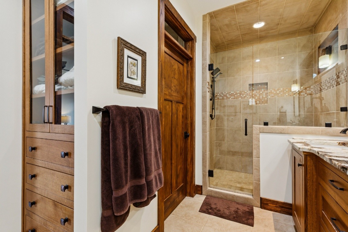394 Myers Point Road Sewanee, TN 37375 - Photo 20 of 44 a view of a bathroom with a shower and a sink