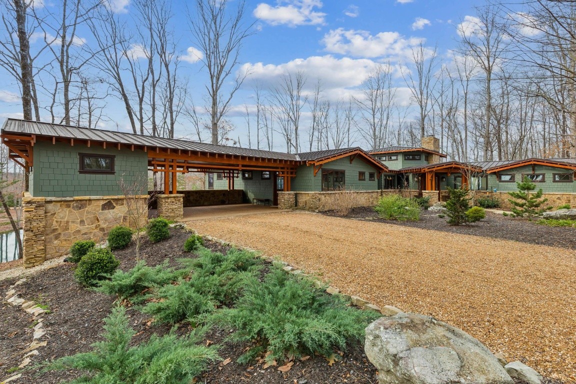 394 Myers Point Road Sewanee, TN 37375 - Photo 2 of 44 a front view of a house with a yard