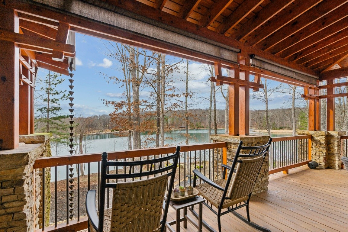 394 Myers Point Road Sewanee, TN 37375 - Photo 3 of 44 a view of a balcony with furniture