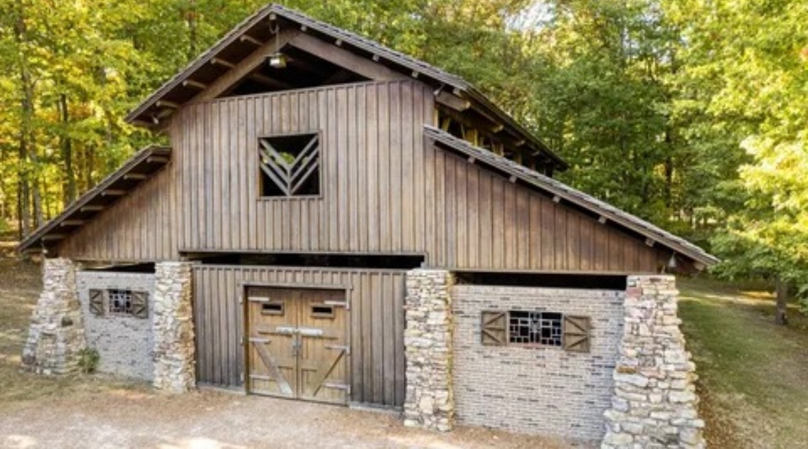 394 Myers Point Road Sewanee, TN 37375 - Photo 43 of 44 a front view of a house with garage