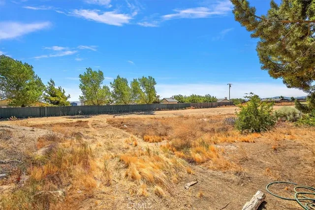 a view of lake with green space