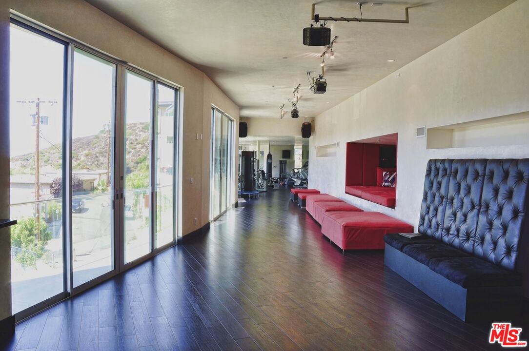 6425 Weidlake Drive Los Angeles, CA 90068 - Photo 18 of 37 a living room with furniture and wooden floor