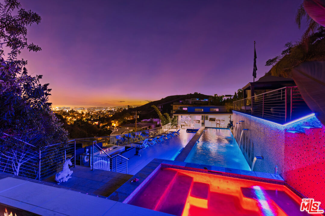 6425 Weidlake Drive Los Angeles, CA 90068 - Photo 3 of 37 a view of swimming pool with outdoor seating