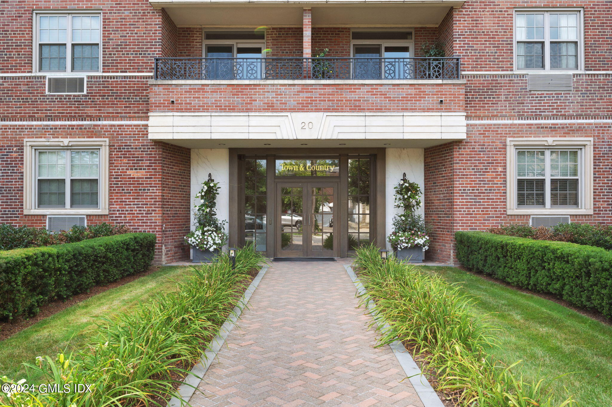 20 Church Street, Unit B11 Greenwich, CT 06830 - Photo 1 of 23 a view of brick building with a outdoor space