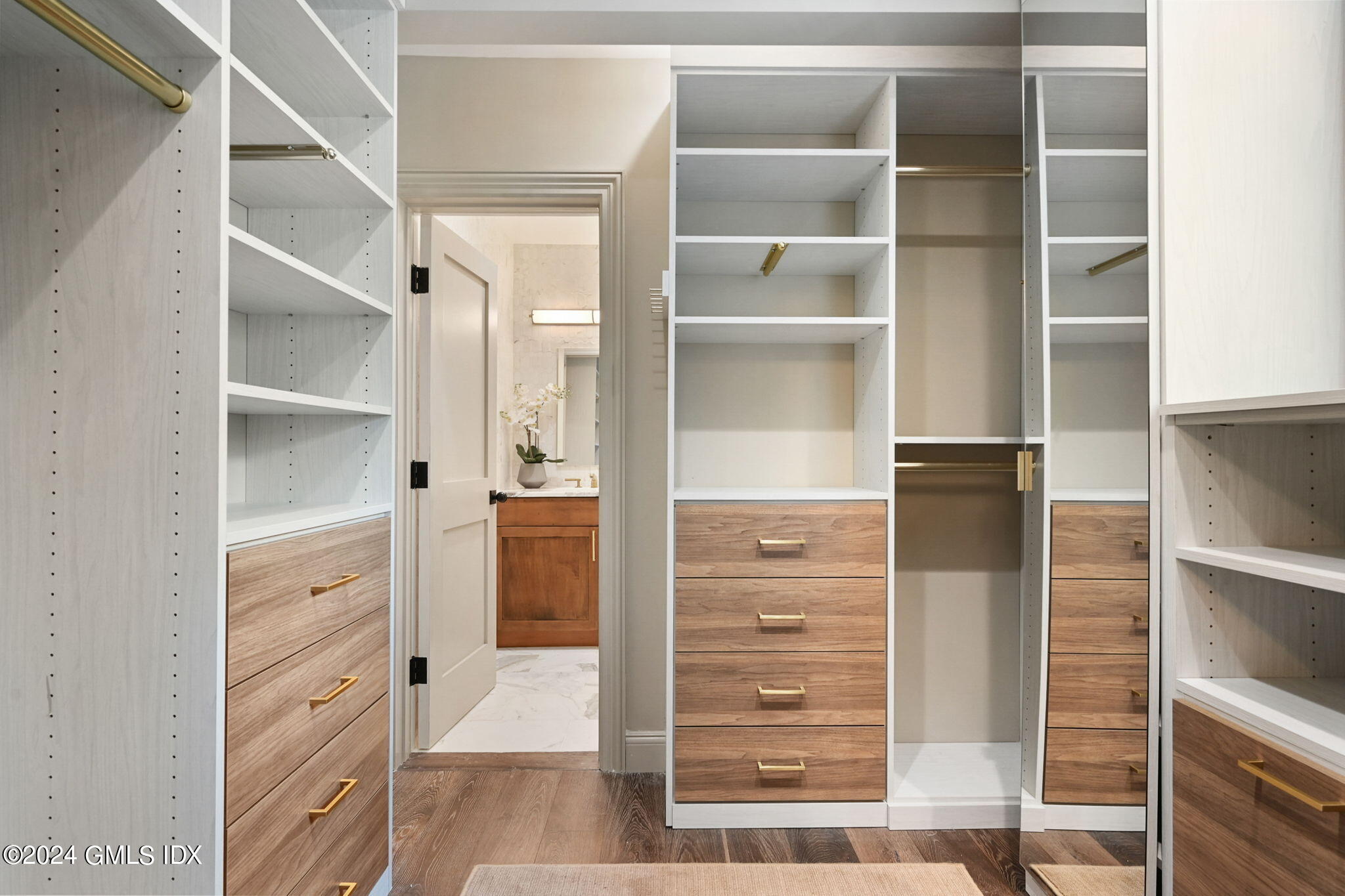20 Church Street, Unit B11 Greenwich, CT 06830 - Photo 13 of 23 a view of walk in closet with empty racks