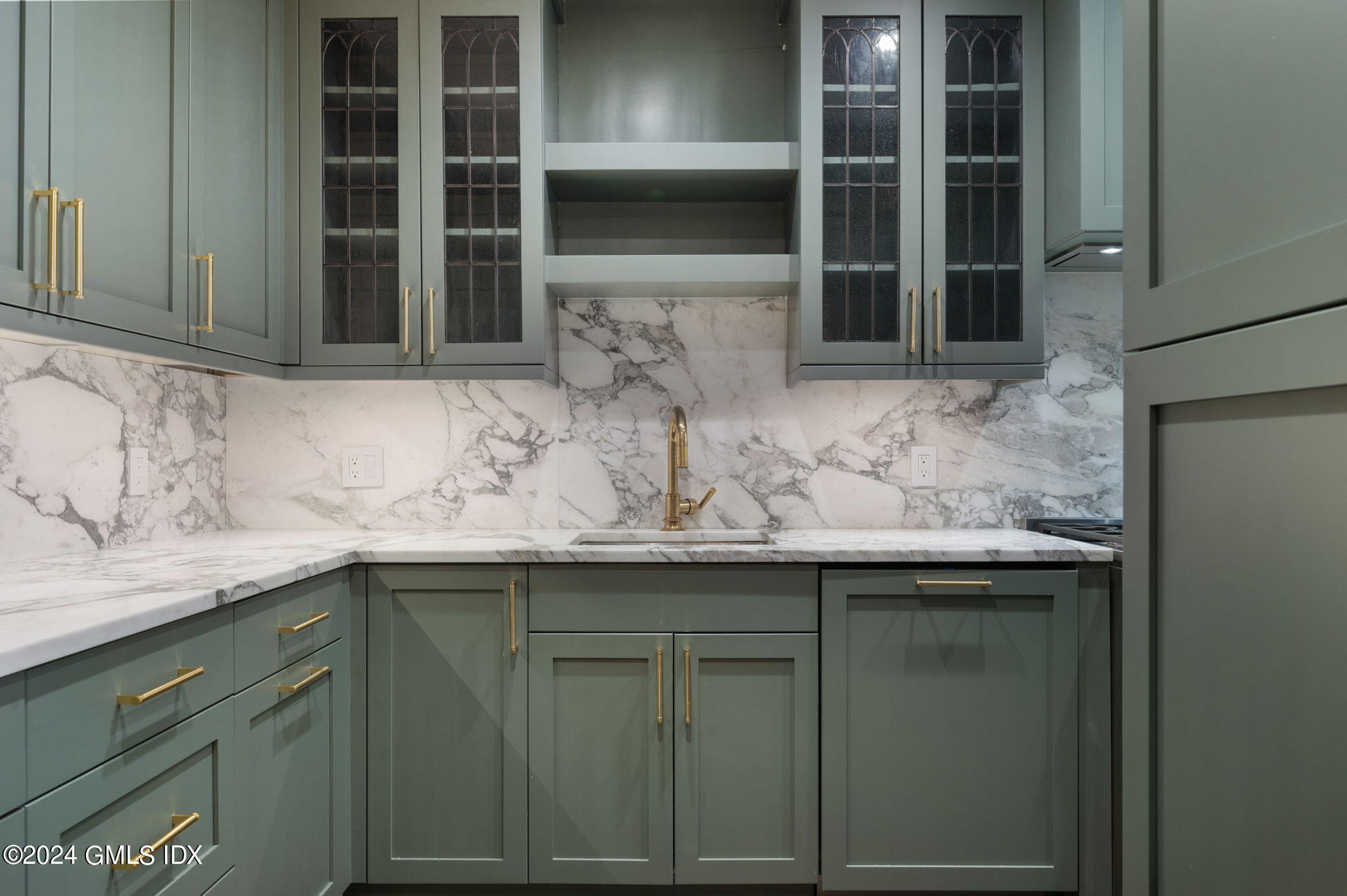 20 Church Street, Unit B11 Greenwich, CT 06830 - Photo 14 of 23 a kitchen with a sink and cabinets