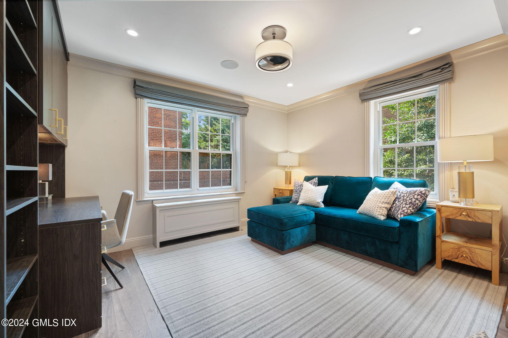 20 Church Street, Unit B11 Greenwich, CT 06830 - Photo 16 of 23 a living room with furniture and a large window