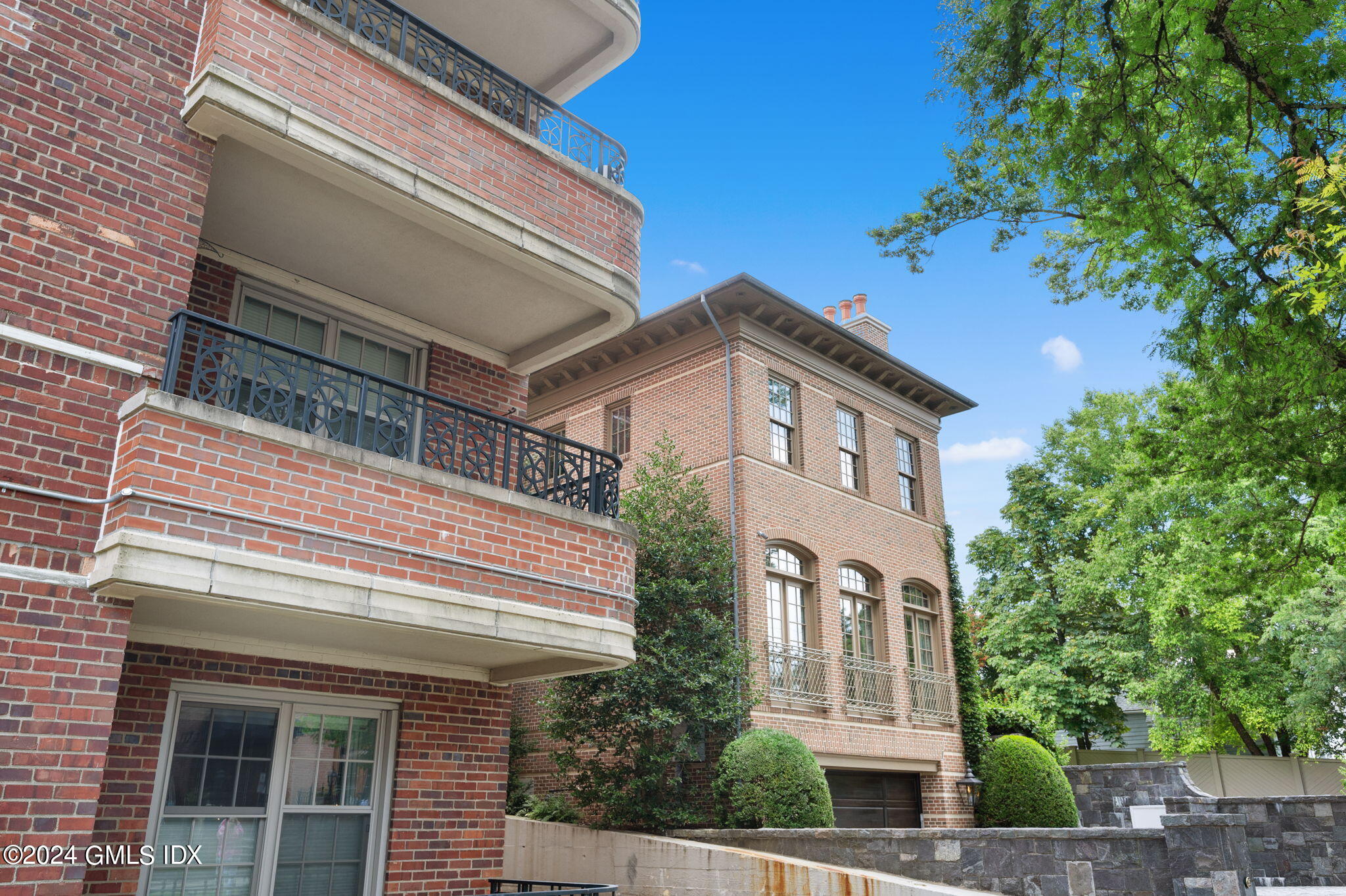 20 Church Street, Unit B11 Greenwich, CT 06830 - Photo 20 of 23 a front view of a house