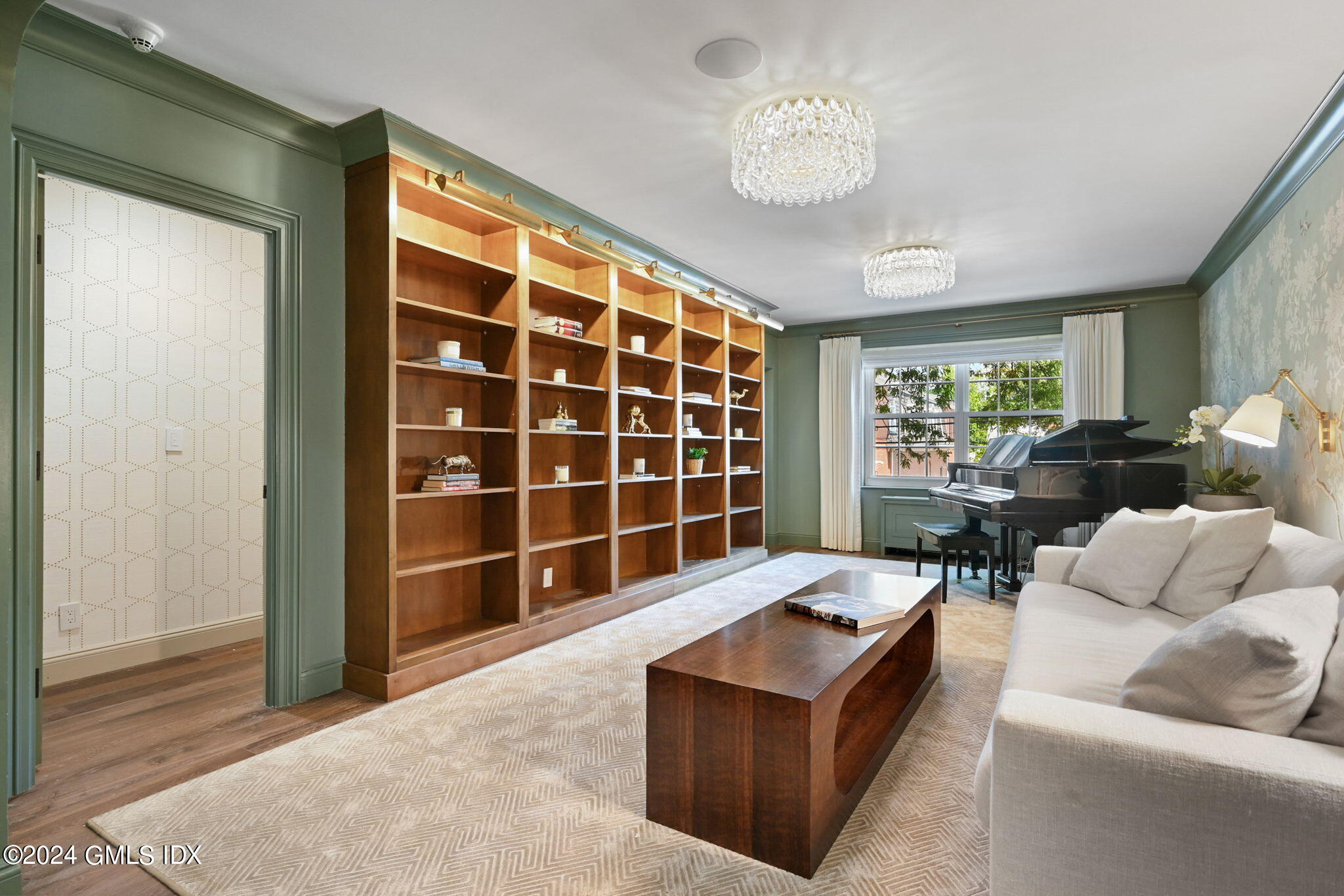 20 Church Street, Unit B11 Greenwich, CT 06830 - Photo 6 of 23 a living room with furniture and a large window