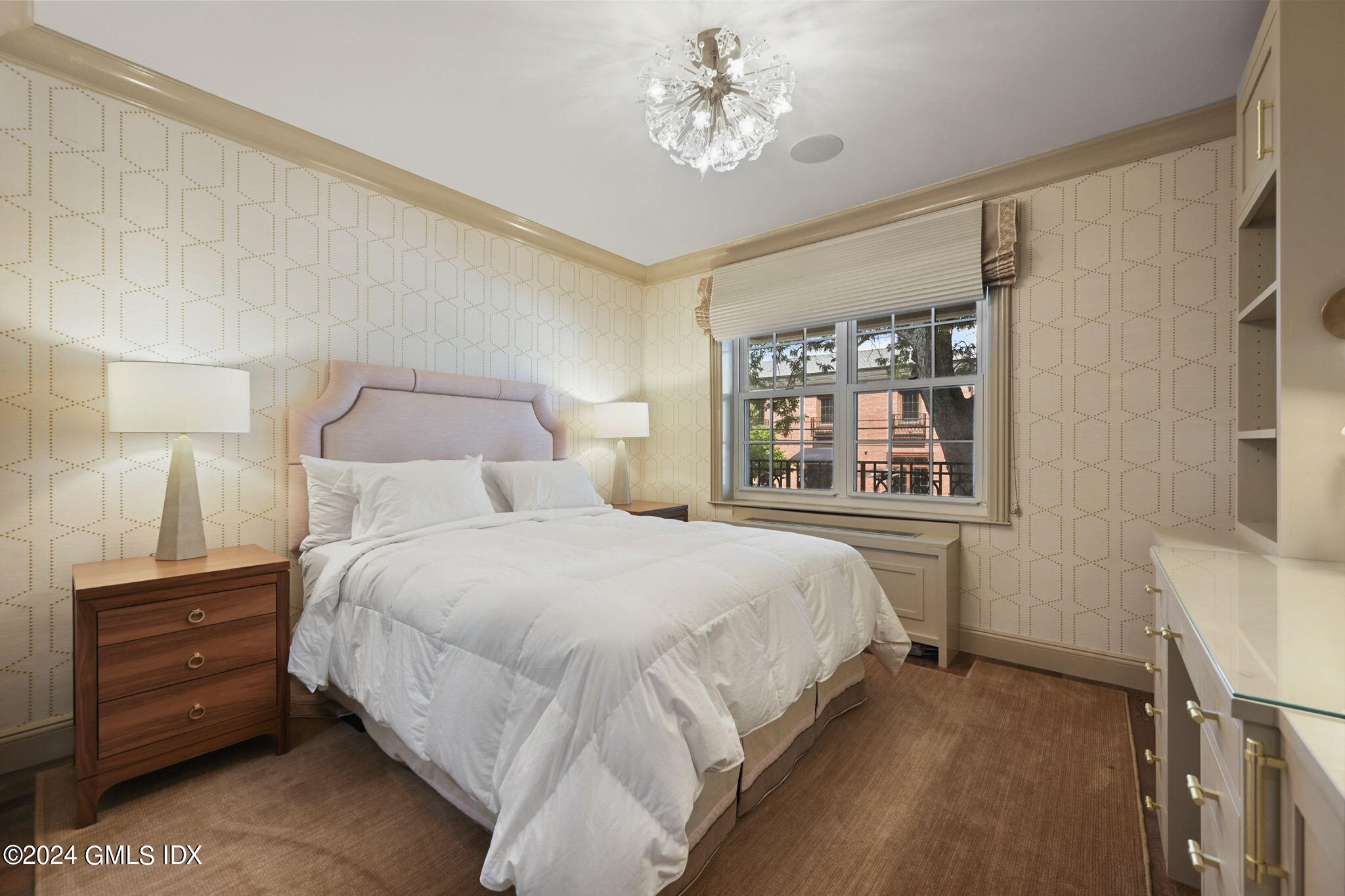 20 Church Street, Unit B11 Greenwich, CT 06830 - Photo 10 of 23 a bedroom with a bed dresser and a window