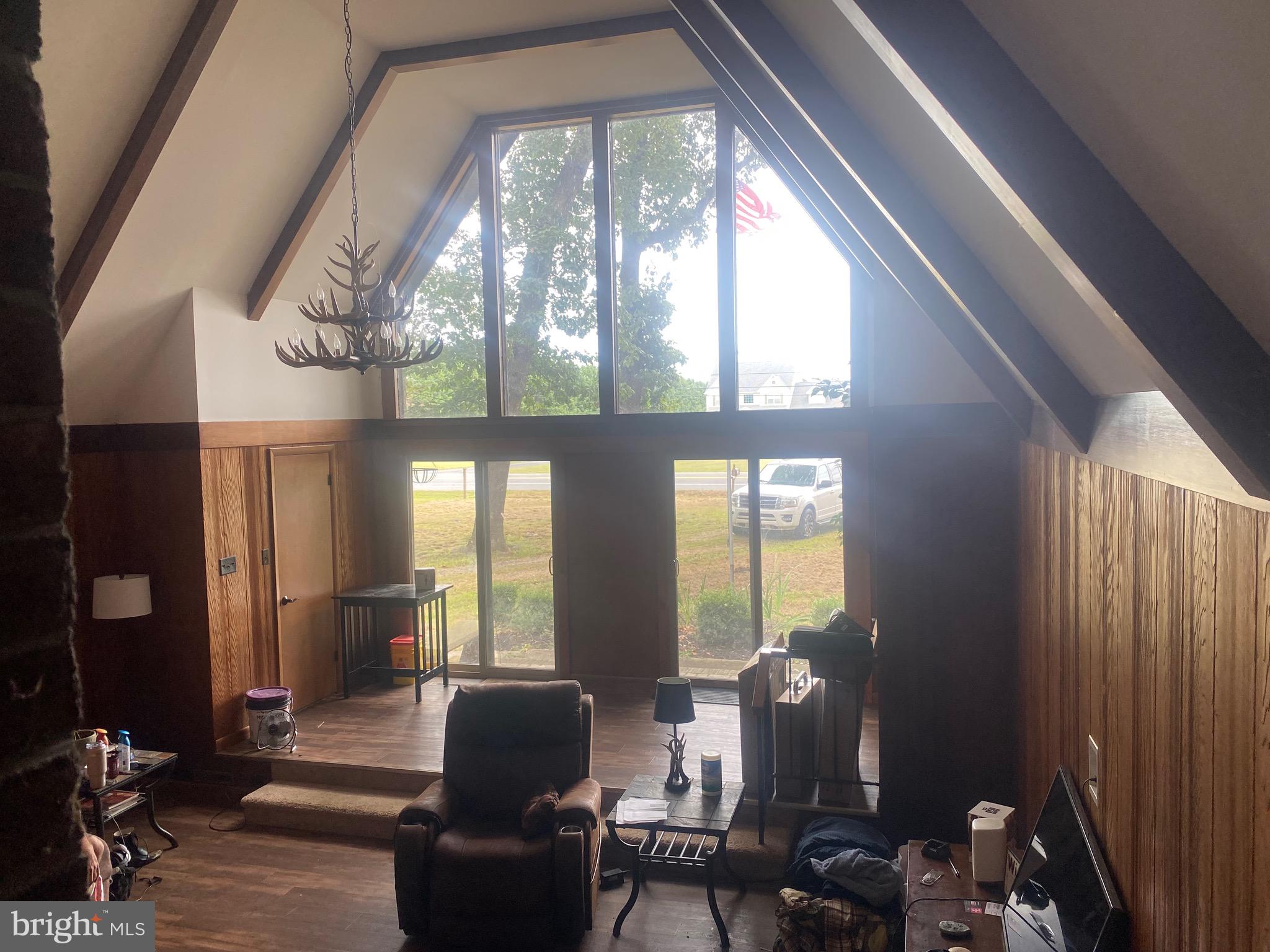 22502 Atlanta Road Seaford, DE 19973 - Photo 5 of 13 a living room with furniture and large windows