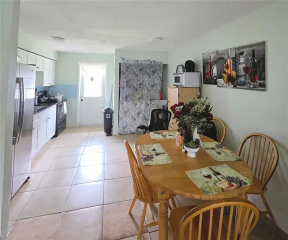 a view of a dining room with furniture