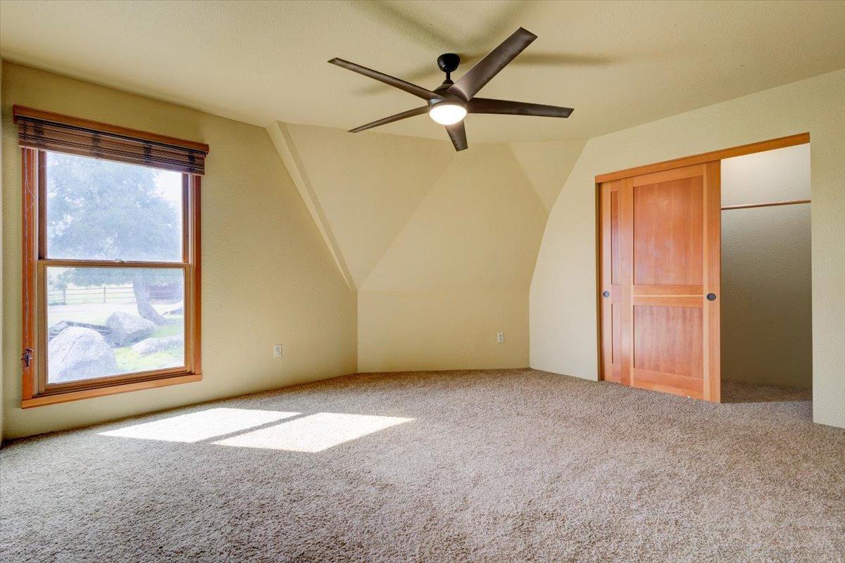 41622 Blue Oak Drive Springville, CA 93265 - Photo 25 of 68 an empty room with windows and fan